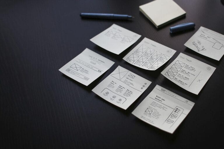 Free note papers with business - a bunch of paper notes on a table