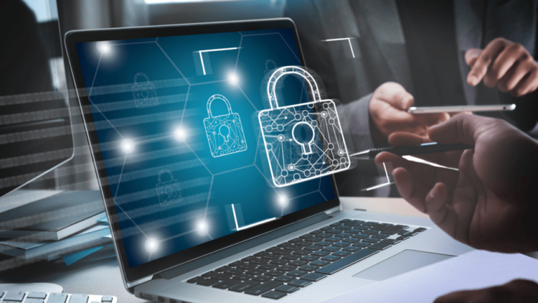 Top Website Security Risks Every Business Owner Should Know 1 a laptop with a digitally look lock , someone hands appear in front